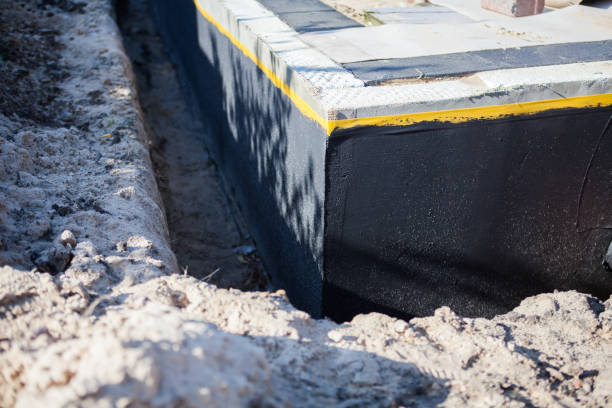 Professional Exterior Waterproofing technician working in Friendship, IN